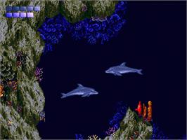 In game image of Ecco the Dolphin on the Sega Nomad.