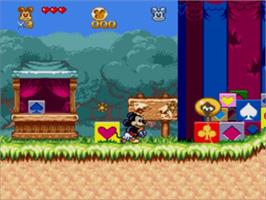 In game image of Great Circus Mystery, The - starring Mickey and Minnie Mouse on the Sega Nomad.