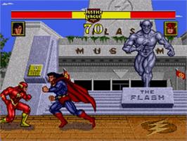In game image of Justice League Task Force on the Sega Nomad.