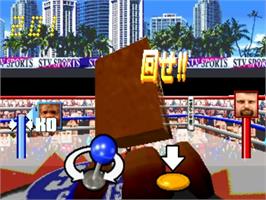 In game image of Funky Head Boxers on the Sega ST-V.