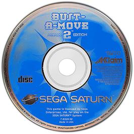 Artwork on the Disc for Bust a Move 2 on the Sega Saturn.