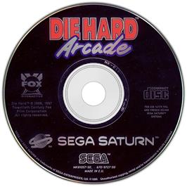 Artwork on the Disc for Die Hard Arcade on the Sega Saturn.