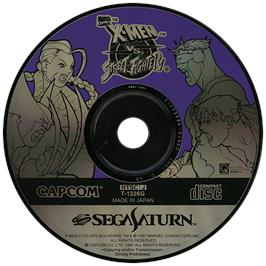 Artwork on the Disc for X-Men Vs. Street Fighter on the Sega Saturn.