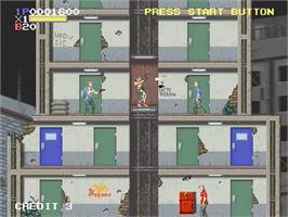 In game image of Elevator Action Returns on the Sega Saturn.