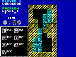In game image of Puzznic on the Sinclair ZX Spectrum.