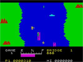 In game image of River Raid on the Sinclair ZX Spectrum.