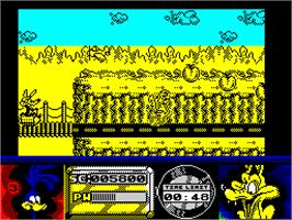 In game image of Road Runner and Wile E. Coyote on the Sinclair ZX Spectrum.