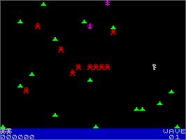 In game image of Robotron: 2084 on the Sinclair ZX Spectrum.