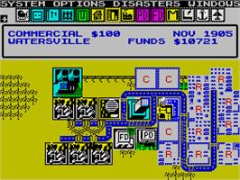 In game image of SimCity on the Sinclair ZX Spectrum.