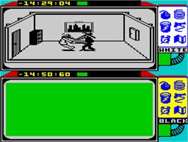 In game image of Spy vs. Spy: The Island Caper on the Sinclair ZX Spectrum.
