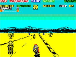In game image of Super Hang-On on the Sinclair ZX Spectrum.