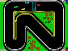 In game image of Super Sprint on the Sinclair ZX Spectrum.