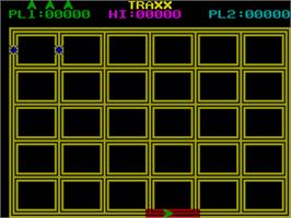 In game image of Traxx on the Sinclair ZX Spectrum.