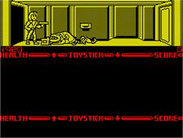 In game image of Xenophobe on the Sinclair ZX Spectrum.