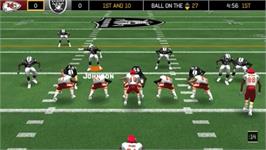 In game image of Madden NFL 6 on the Sony PSP.