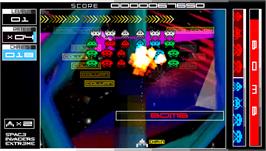 In game image of Space Invaders Extreme on the Sony PSP.