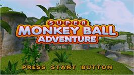 Title screen of Super Monkey Ball Adventure on the Sony PSP.