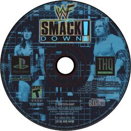 Artwork on the Disc for WWF Smackdown! on the Sony Playstation.
