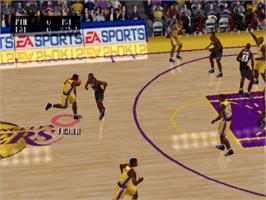 In game image of NBA Live 2002 on the Sony Playstation.