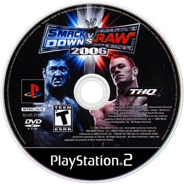 Artwork on the Disc for WWE Smackdown vs. Raw 2006 on the Sony Playstation 2.