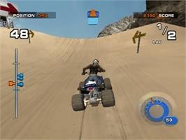 In game image of ATV: Quad Power Racing 2 on the Sony Playstation 2.