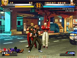 In game image of King of Fighters 98 Ultimate Match on the Taito Type X.