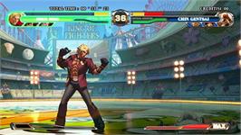 In game image of King of Fighters XII, The on the Taito Type X2.