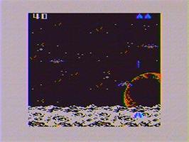 In game image of Demon Attack on the Tandy TRS-80.