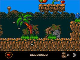 In game image of Chuck Rock on the Acorn Archimedes.
