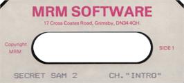 Top of cartridge artwork for Secret Sam 2 on the Acorn BBC Micro.