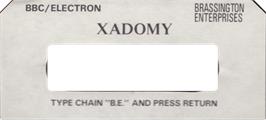 Top of cartridge artwork for Xadomy on the Acorn Electron.