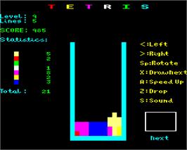 In game image of Tetris (Mirrorsoft) on the Acorn Electron.