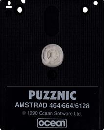 Cartridge artwork for Puzznic on the Amstrad CPC.