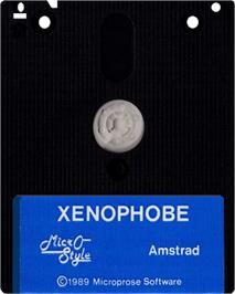 Cartridge artwork for Xenophobe on the Amstrad CPC.