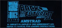 Top of cartridge artwork for Back to the Future 2 on the Amstrad CPC.