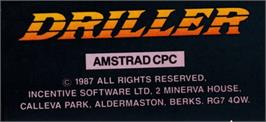 Top of cartridge artwork for Driller on the Amstrad CPC.