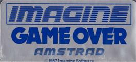 Top of cartridge artwork for Game Over on the Amstrad CPC.