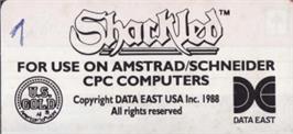 Top of cartridge artwork for Shackled on the Amstrad CPC.