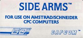 Top of cartridge artwork for Side Arms on the Amstrad CPC.