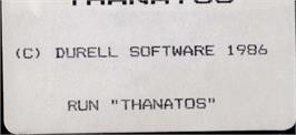 Top of cartridge artwork for Thanatos on the Amstrad CPC.