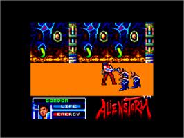 In game image of Alien Storm on the Amstrad CPC.