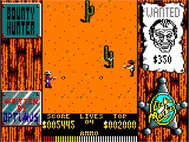 In game image of Bounty Hunter (River Software) on the Amstrad CPC.