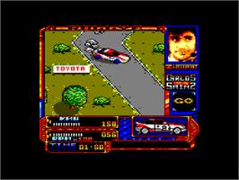 In game image of Carlos Sainz on the Amstrad CPC.