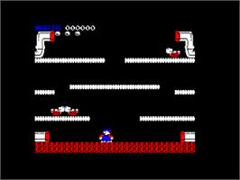 In game image of Mario Bros. on the Amstrad CPC.