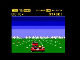 In game image of Out Run on the Amstrad CPC.