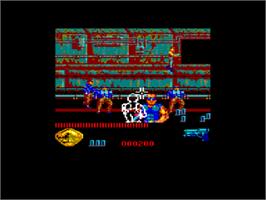 In game image of Predator 2 on the Amstrad CPC.