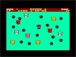 In game image of Psycho Pigs UXB on the Amstrad CPC.