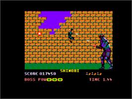 In game image of Shinobi on the Amstrad CPC.