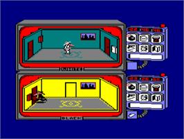 In game image of Spy vs. Spy on the Amstrad CPC.
