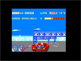 In game image of Turbo Out Run on the Amstrad CPC.